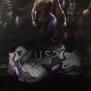 Black, grey and metallic purple Nike zoom
